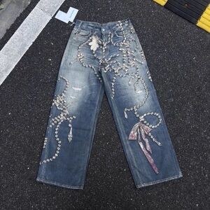 Acne Studios 2025 Bow-Tie Jeans with Silver Embellishments